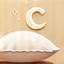 Icon of a stylized moon and stars over a fluffy pillow, symbolizing optimized sleep.
