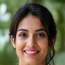 Portrait of Dr. Anya Sharma, a friendly and insightful woman with a background in herbal medicine